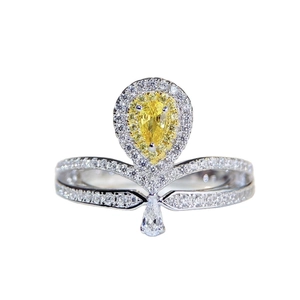 Luxurious S925 silver ring featuring a yellow pear-cut gemstone with halo diamonds