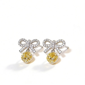 Elegant S925 silver bow stud earrings with yellow round stone and cubic zirconia accents