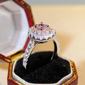 Luxurious S925 silver ring featuring a pink round gem with double halo of sparkling zircons