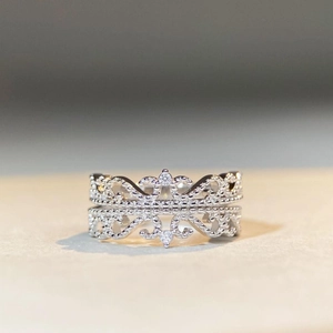 Detailed macro view of S925 sterling silver crown ring with cubic zirconia stones