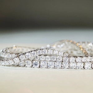 Macro detail of 925 sterling silver tennis bracelets with D color moissanite stones