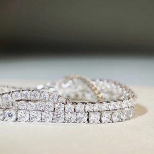 Classic 925 sterling silver tennis bracelet featuring round-cut moissanite in four-prong setting
