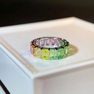 Macro shot of S925 silver rainbow ring featuring emerald-cut multi-color zircons