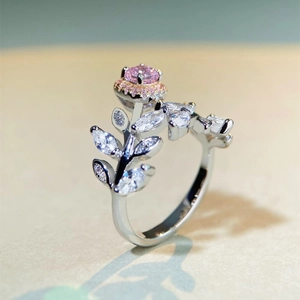 Adjustable 925 silver leaf ring with a pink round gemstone and white diamond accents