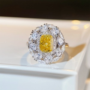 Luxurious S925 silver ring with yellow cushion cut stone and floral diamond halo