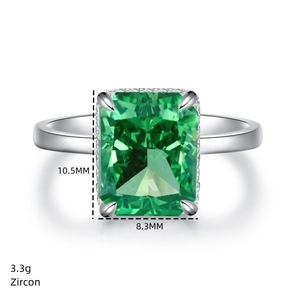 Macro detail of 4ct emerald-cut green zircon ring showing 10.5mm x 8.3mm stone size