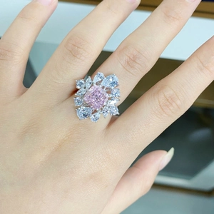 Elegant S925 sterling silver ring with pink cushion-cut center stone and floral cluster