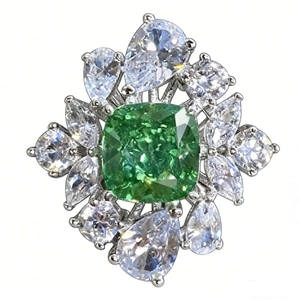 S925 silver ring featuring radiant cut green gemstone and sparkling flower cluster halo
