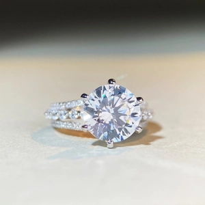 Luxurious 5 carat moissanite silver ring with round brilliant cut and pavé diamonds