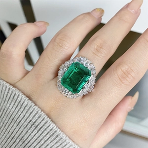 Luxury S925 silver ring with emerald cut green gemstone and multi-layer zircon cluster