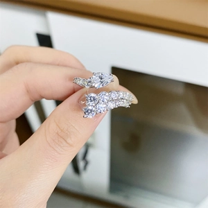 Close-up of S925 sterling silver pear-shaped ring with clusters of sparkling cubic zirconia