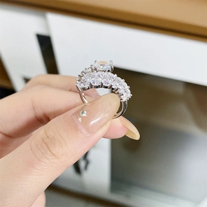 Detailed view of S925 sterling silver adjustable ring with full pavé cubic zirconia setting