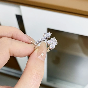 Close-up of S925 sterling silver adjustable ring with teardrop and round zircon stones