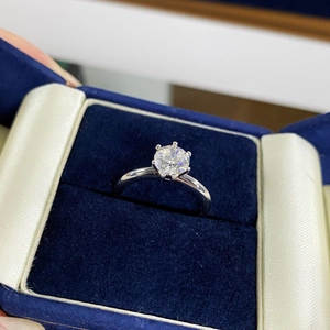 Classic six-prong 925 silver ring with 1 carat moissanite in a velvet jewelry box