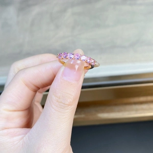 S925 sterling silver ring with seven pink round-cut gemstones in a classic row setting