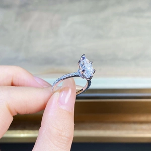 Elegant S925 sterling silver ring with marquise cut crystal and micro-pave diamond band