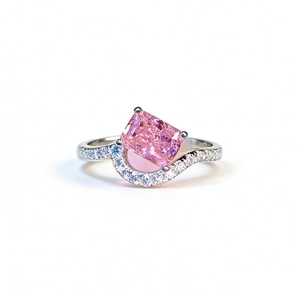 S925 silver ring featuring a radiant cut pink gemstone and pavé wave-shaped band