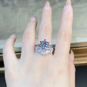 Close-up of a 925 sterling silver wheat-style V-shaped ring with marquise cut diamonds