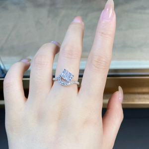Sparkling S925 silver wave ring with a square-cut high carbon diamond shown on a hand