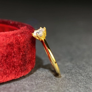 Classic 1ct D-color moissanite ring with six-prong setting in 18K yellow gold finish