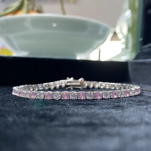 S925 sterling silver tennis bracelet with alternating pink and white zircons on black velvet