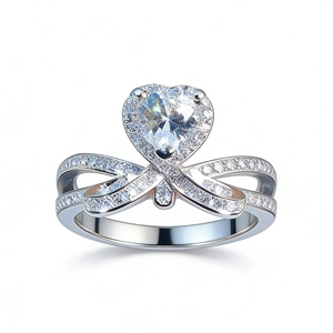 S925 sterling silver ring with heart-shaped moissanite and pave ribbon band