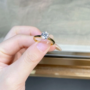Detailed view of 18K gold plated S925 silver ring featuring a six-prong moissanite setting