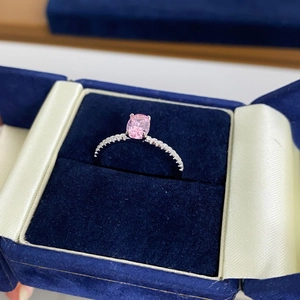 Elegant S925 silver ring featuring a large oval pink gemstone in a luxury jewelry box