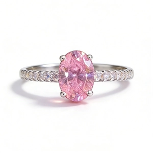 Elegant S925 silver ring featuring an oval pink gemstone and pavé set side stones