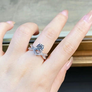 925 silver crossover ring with 1 carat round moissanite and pavé set accent stones