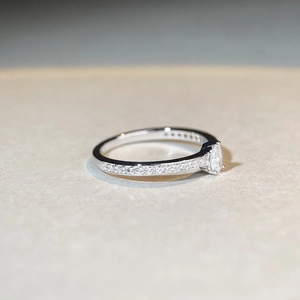 Minimalist S925 sterling silver ring with marquise-cut stone and pavé-set side diamonds