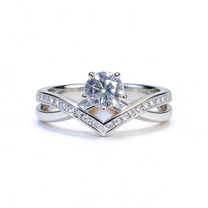 925 silver crossover ring featuring a 1ct round moissanite with V-shaped pavé diamond band