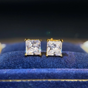 Classic 925 silver gold-plated princess cut moissanite stud earrings in a blue box