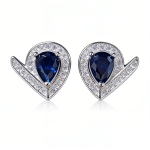 Élégantes boucles d'oreilles en argent S925 en V avec saphir bleu en forme de poire