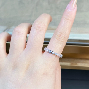 Close-up of S925 sterling silver eternity ring with heart-shaped cubic zirconia