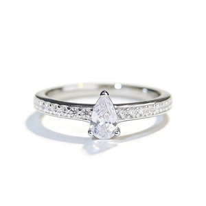 Elegant S925 sterling silver ring featuring a pear-cut drop stone and pavé zircon band