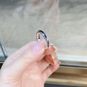 Polished silver ring with black inlay and milgrain edge detailing for men