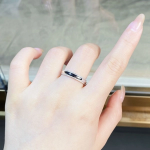 Macro detail of S925 silver ring with black polished inlay and beaded edge craftsmanship