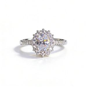 Elegant S925 sterling silver ring with oval cut halo diamond on white background