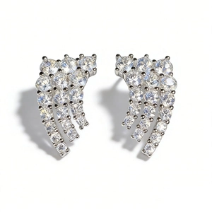 Minimalist S925 sterling silver wing earrings featuring sparkling cubic zirconia stones