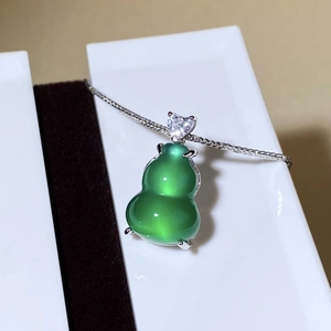 Close-up of S925 silver necklace featuring a green chalcedony gourd pendant with heart zircon