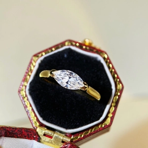 Marquise cut moissanite ring in 925 sterling silver set in a vintage red jewelry box