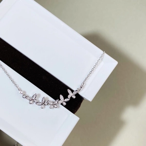 Elegant 925 sterling silver clavicle necklace featuring five sparkling butterfly pendants