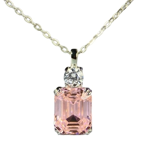 Minimalist 925 silver necklace with emerald-cut pink gemstone pendant on white backdrop