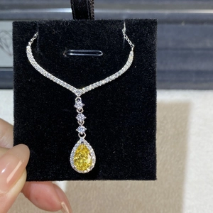 Elegant S925 sterling silver necklace featuring a yellow teardrop cut ice flower pendant
