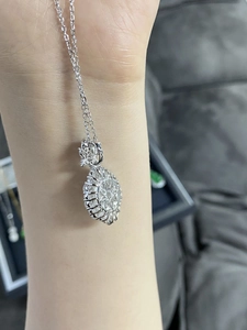 Detail of S925 sterling silver flower pendant necklace with icy jade gemstone