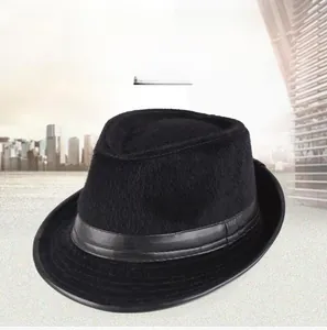 Detailed view of black fedora hat with elegant leather trim and soft faux mink fur texture