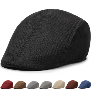 Detail shot of breathable linen flat cap showing textured fabric and multiple color options