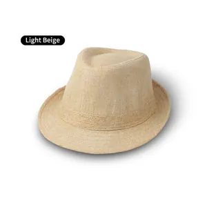 Macro detail of breathable light beige linen fedora hat featuring a fine woven texture