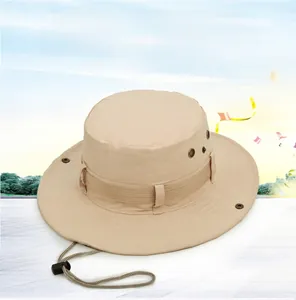 Detail of outdoor sun hat featuring metal ventilation eyelets and adjustable chin strap